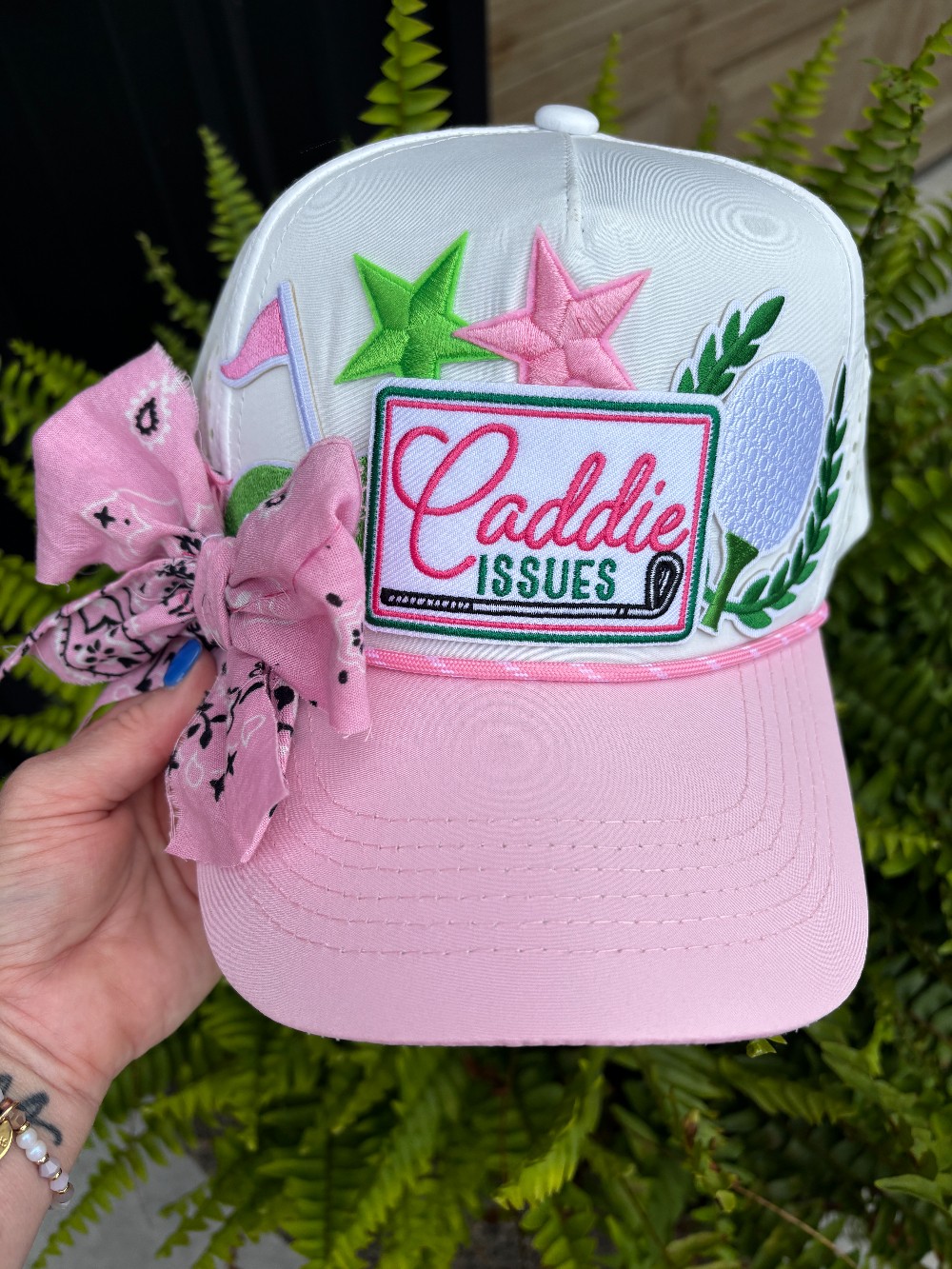 Caddie Issues Trucker Hat