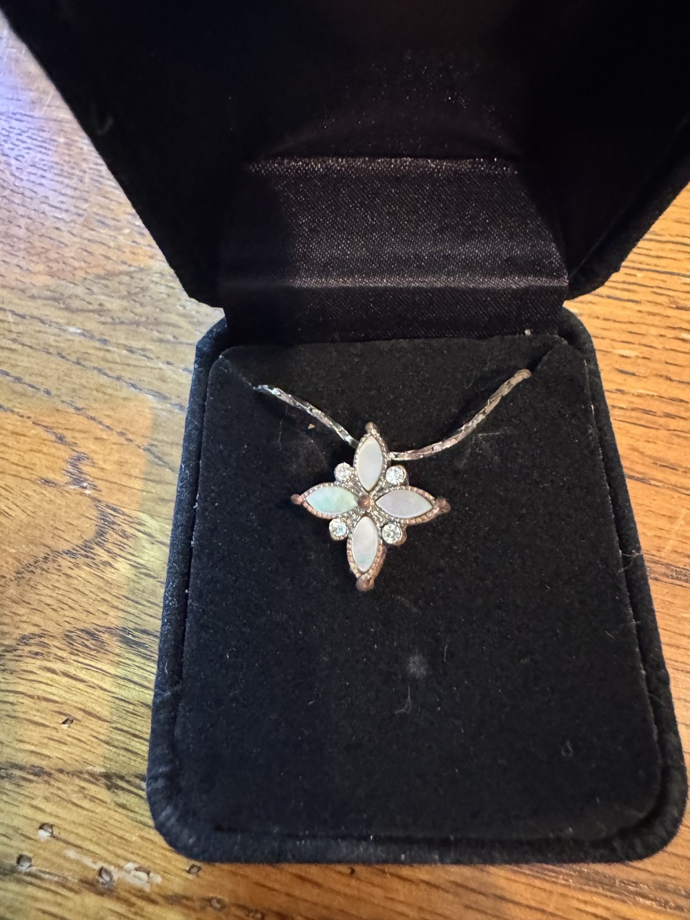 Mother of Pearl and clear gemstone necklace.
