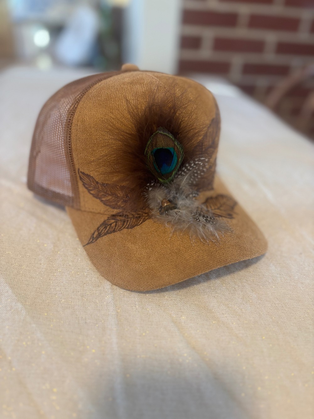 Feather trucker hat- tan