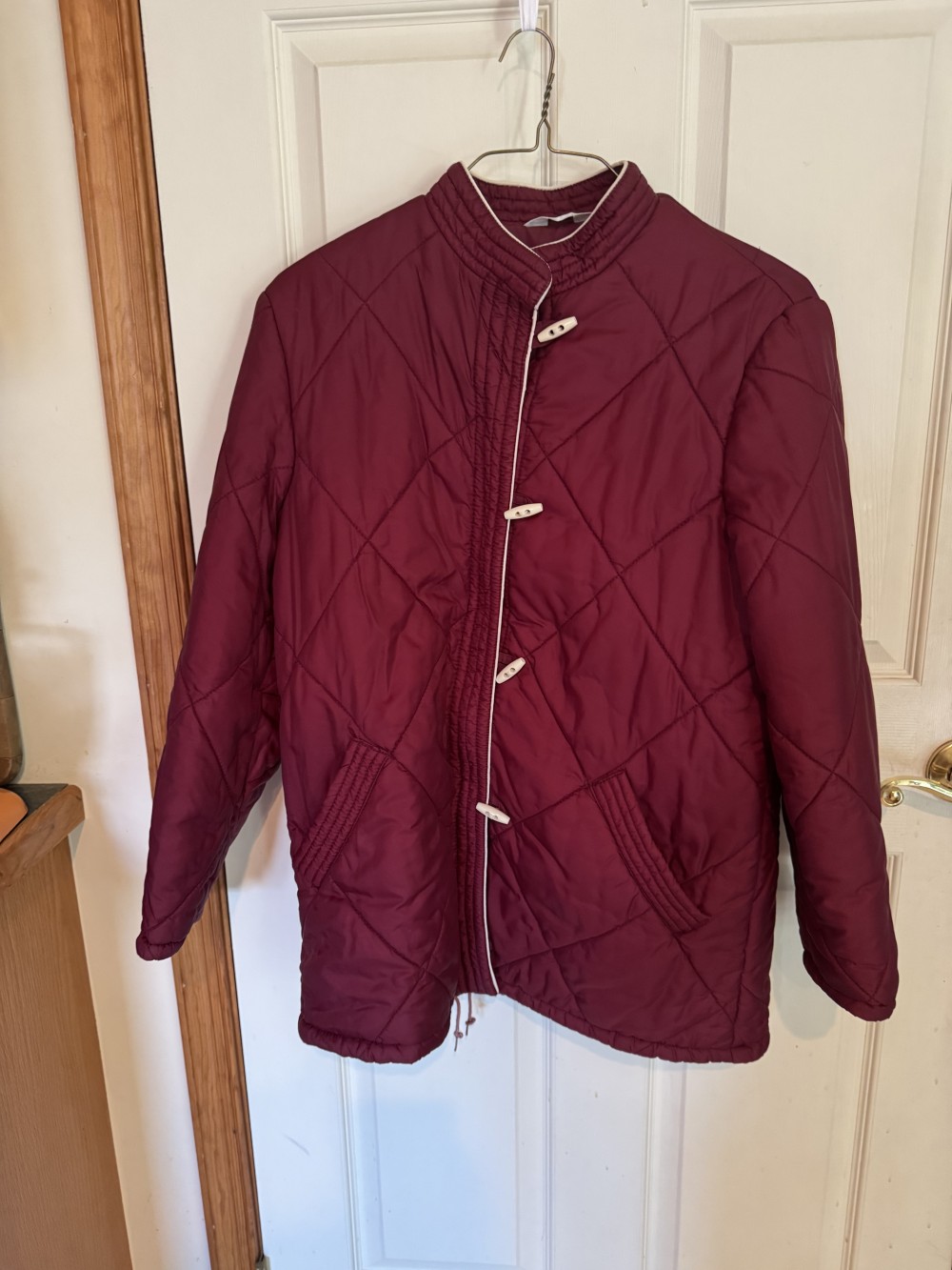 Burgundy Quilted Jacket. Zipper and Toggle closure.