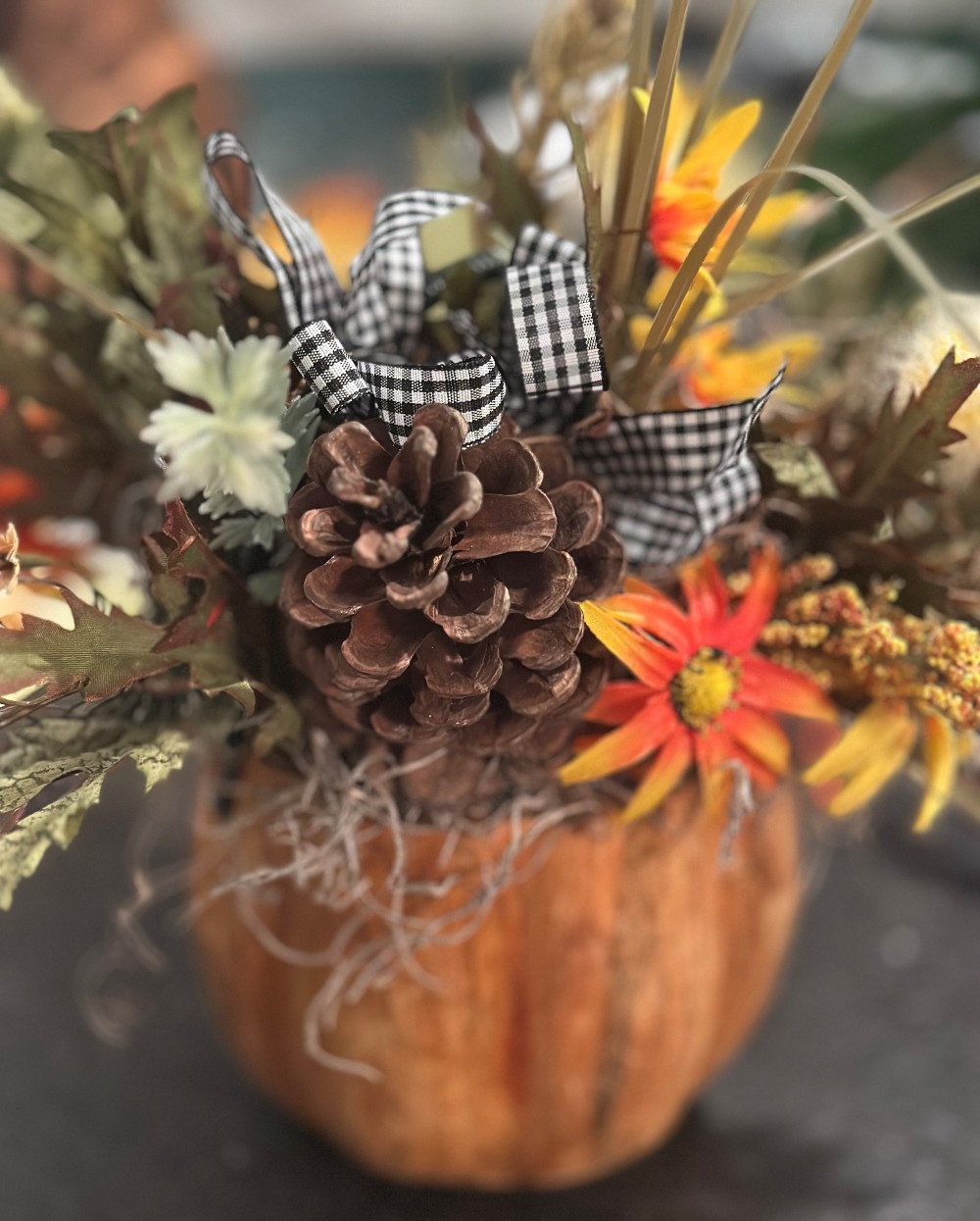 Wood pumpkin floral arrangement