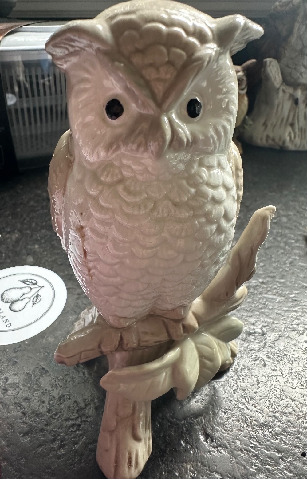 vintage ivory-glazed ceramic owl figurine featuring a detailed, textured feather pattern