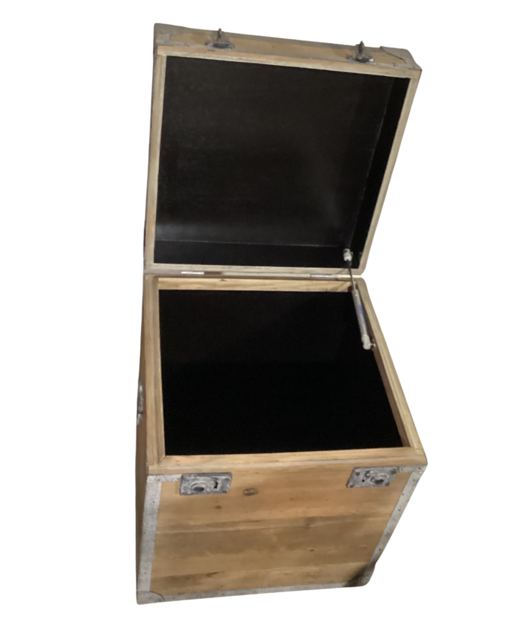 Decorative storage chest constructed with natural wood and galvanized metal hardware and corner reinforcements.