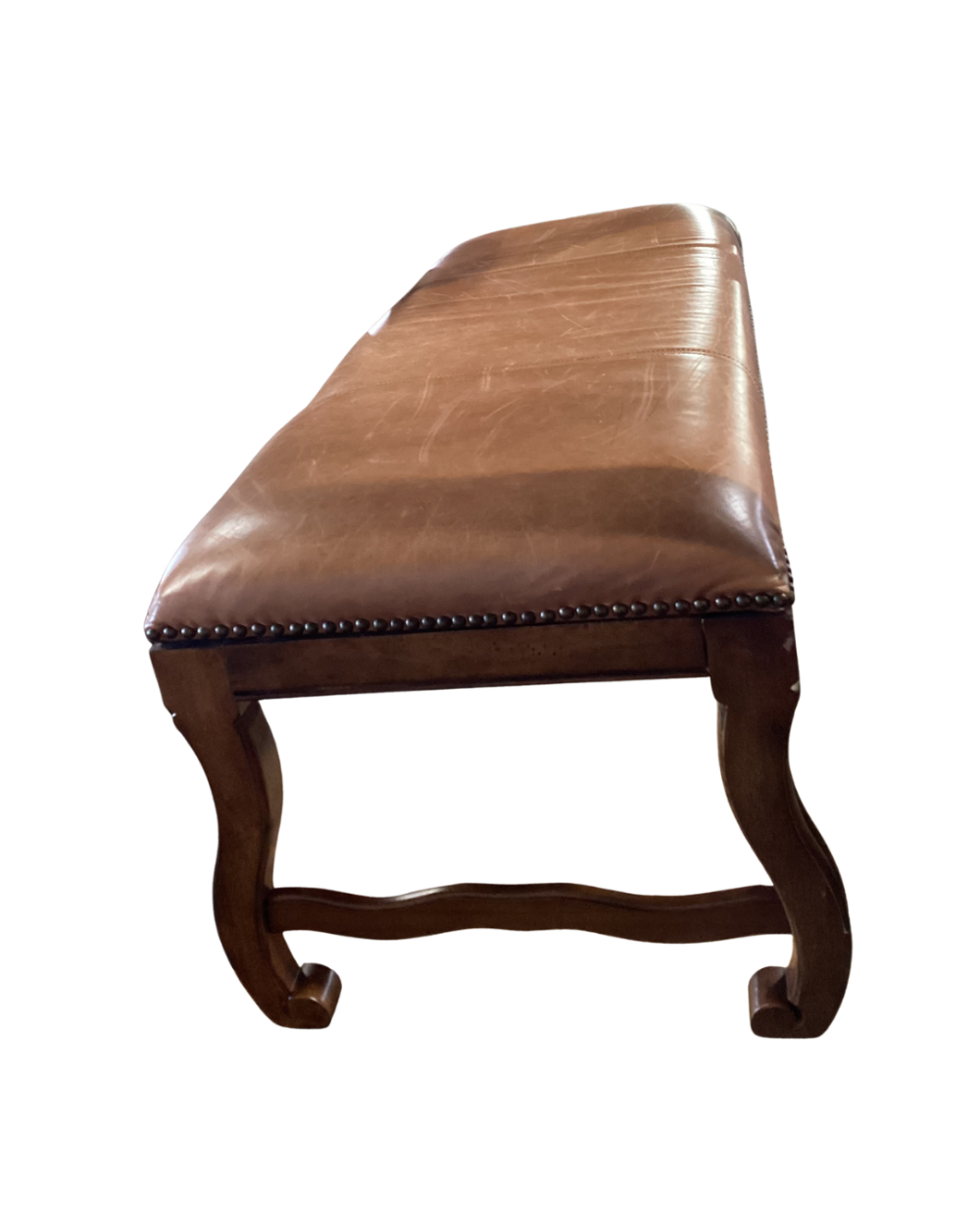 Leather upholstered bench with carved wooden legs