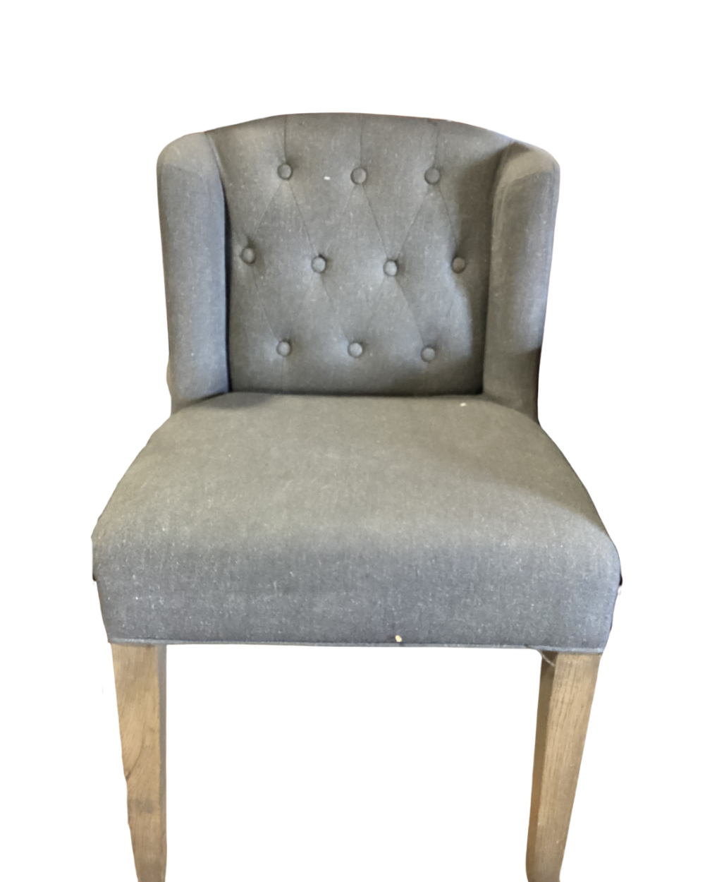 Gray upholstered chair with buttons