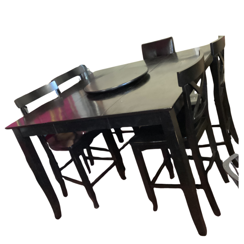 Bar-height dining set with a built-in lazy Susan in the center of the table