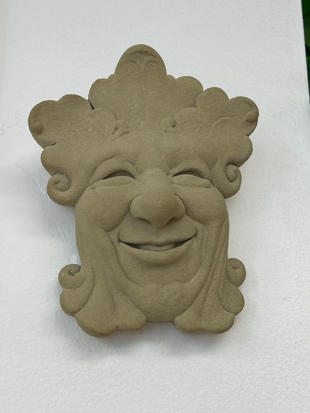 Stone Wall Plaque - Smiling Man
