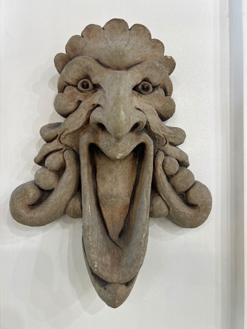 Stone Wall Plaque - Laughing Face