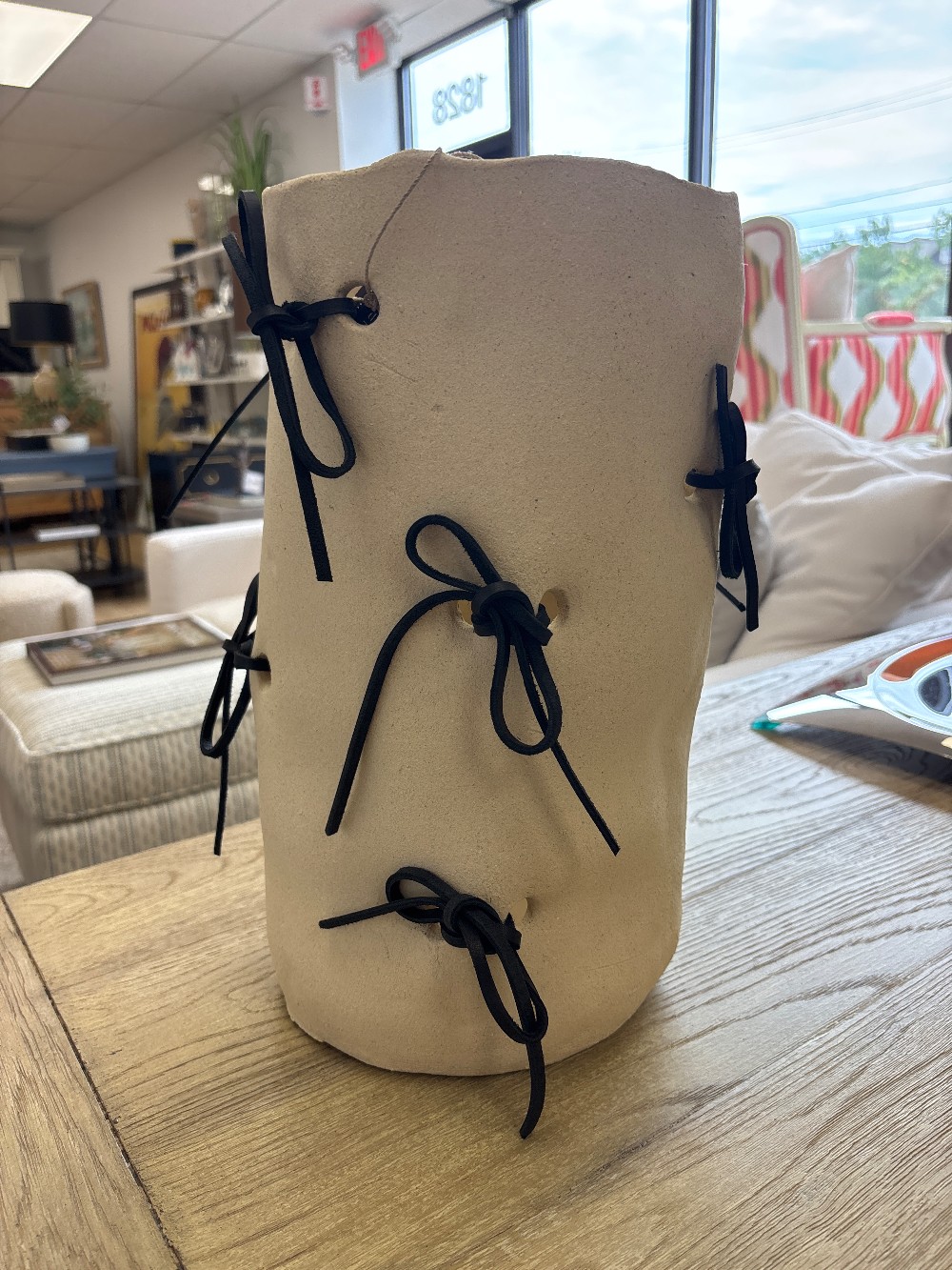 Ceramic Vase with Leather Ties by Paige Schlosser