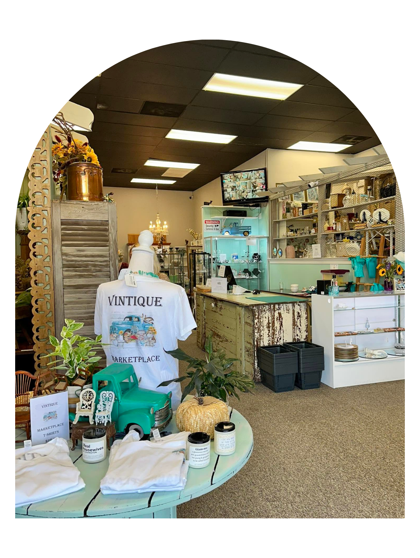 Inside Vintique marketplace featuring antiques, home décor, gifts, and locally made goods.