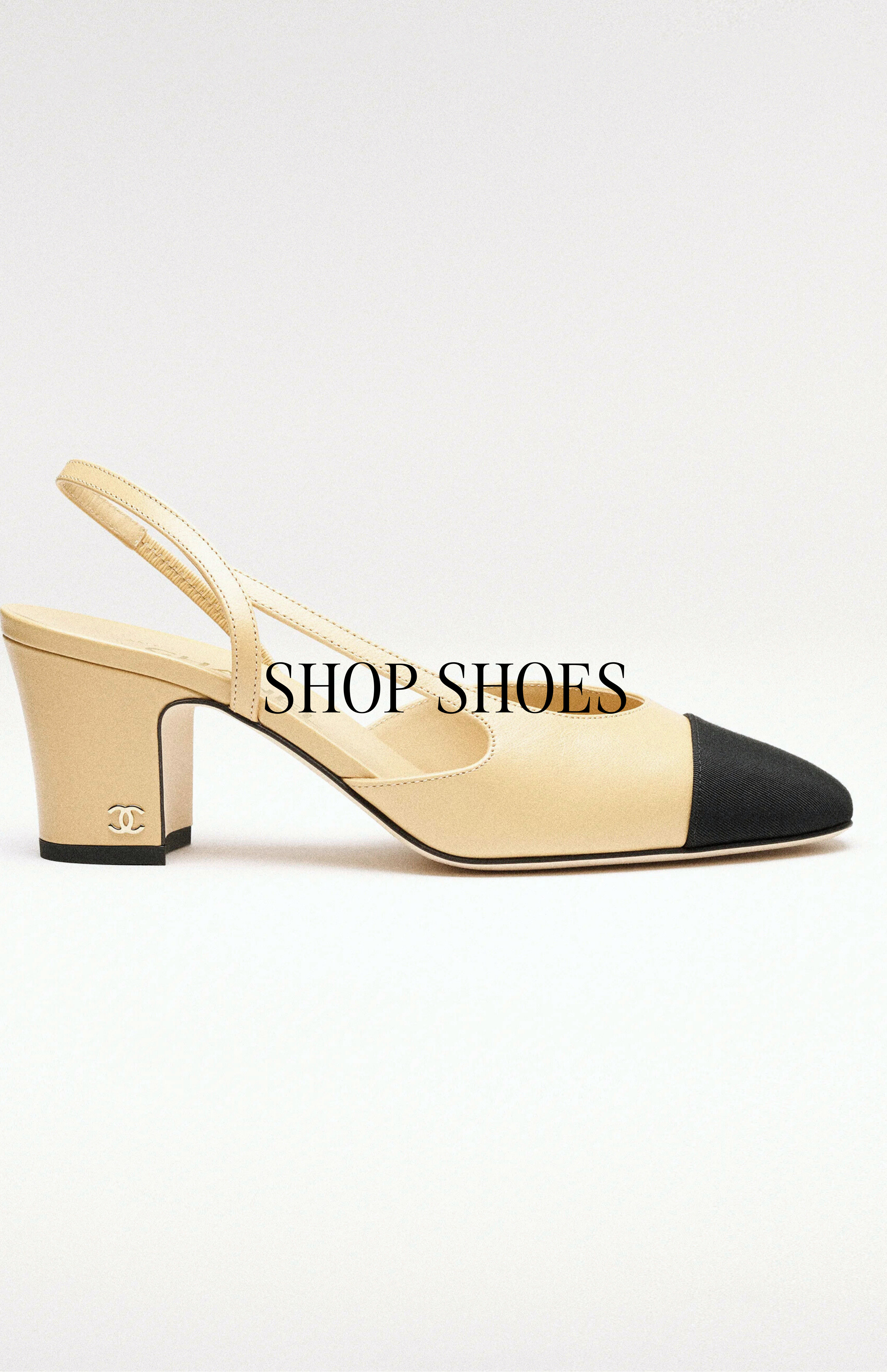 Birdseye view of a pair of gold slip on shoes with a pair of silver shoes behind it.