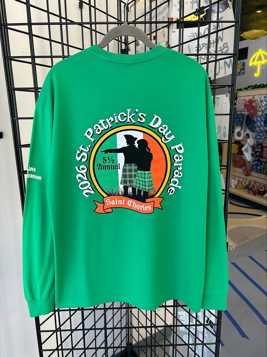 Photo of the Under the Yellow Umbrella sign outside of their store.