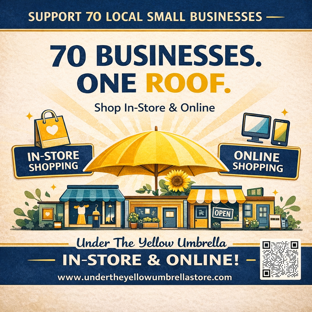 Photo of the Under the Yellow Umbrella sign outside of their store.