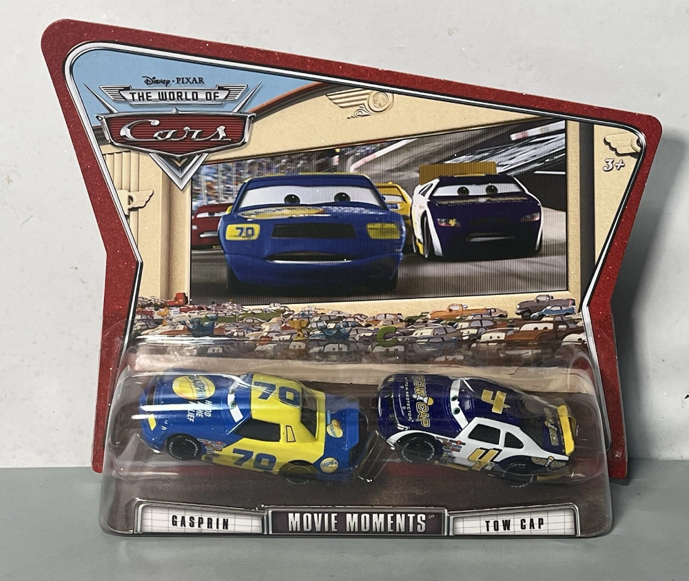 Disney Pixar Cars World of Cars Series Movie Moments Gasprin and Tow Cap NEW