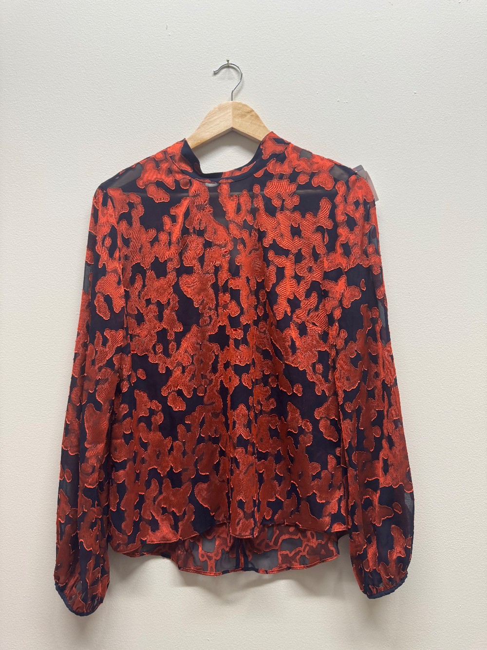 Baboon mock neck blouse