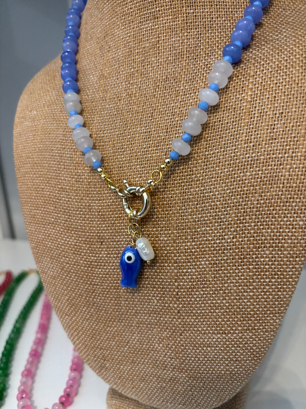 Casa Piper South Blue and White beaded necklace with fish charm