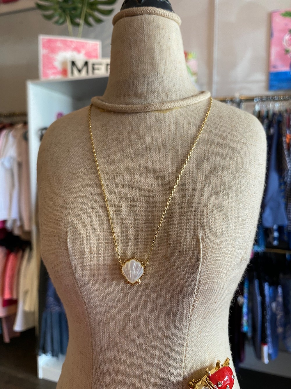 Kendra Scott gold shell necklace