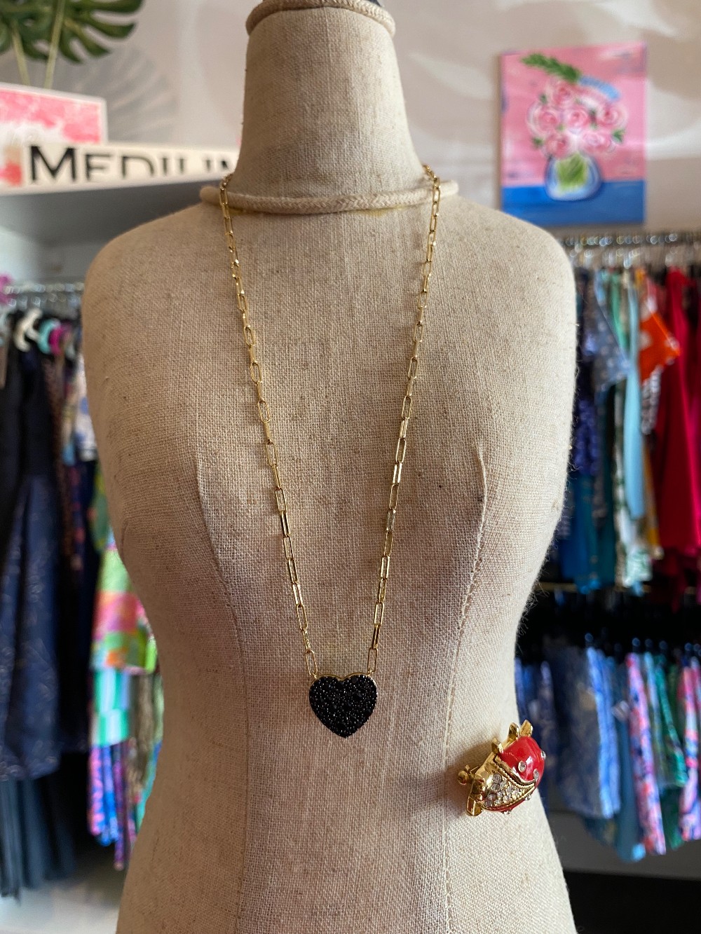 Black heart pendant necklace with gold tone paperclip chain