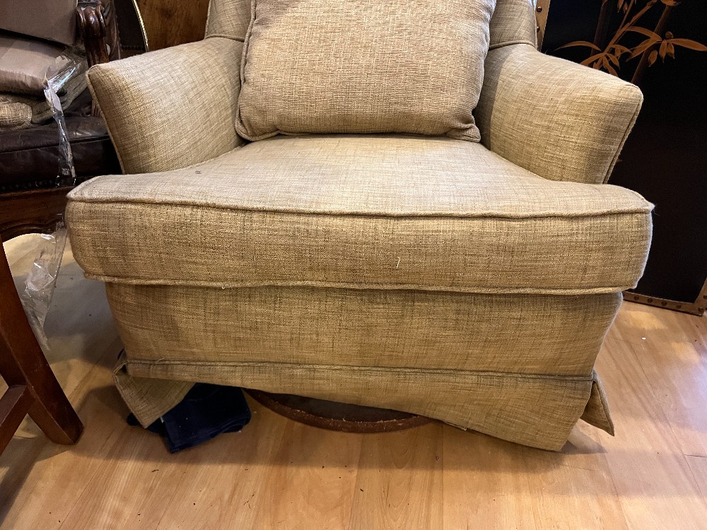 Beige Upholstered Swivel Armchair