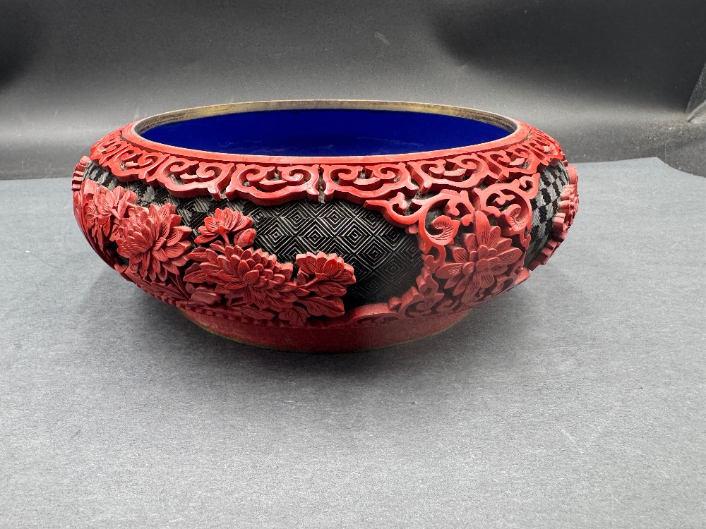 Chinese Cinnabar Style Bowl with Red Raised Carving on Black Ground, Blue Enamel Interior