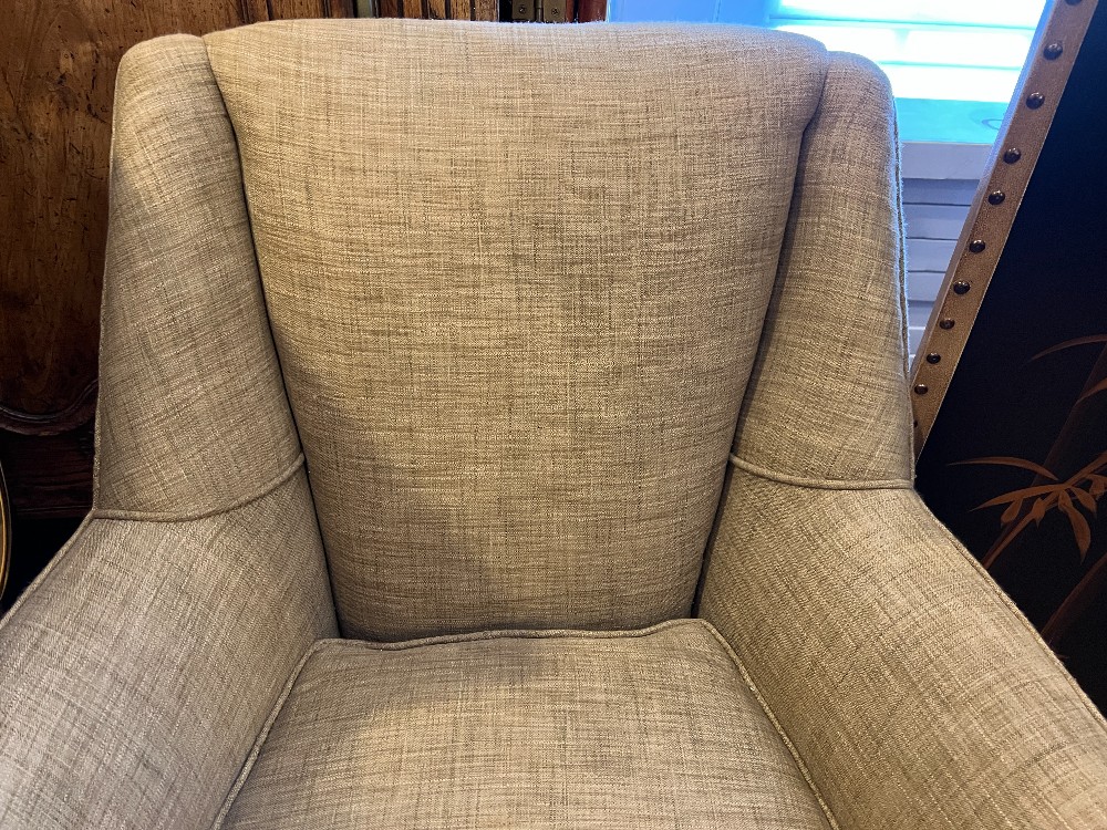 Beige Upholstered Swivel Armchair