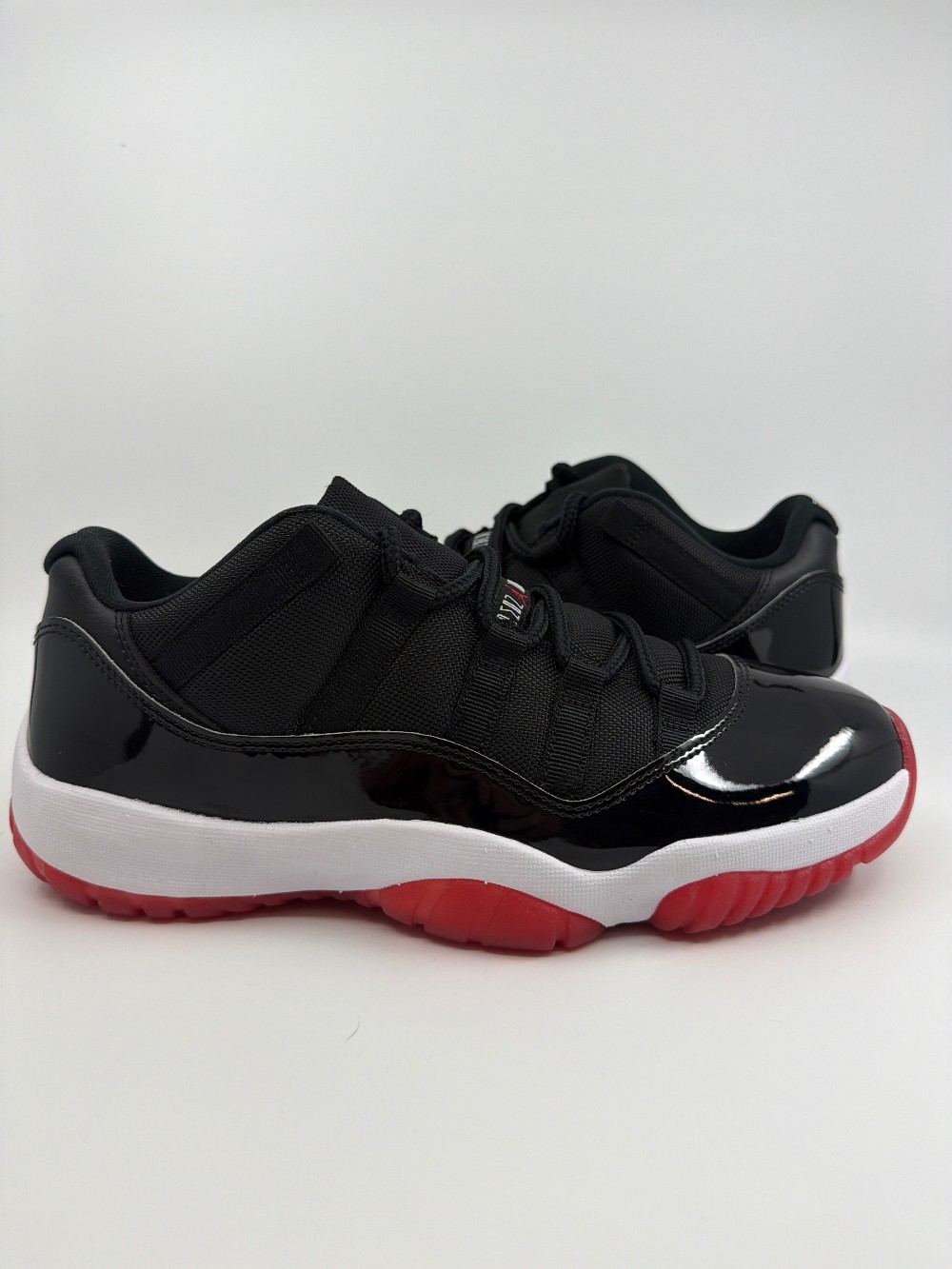 *USED* AJ 11 LOW - BRED (2025)