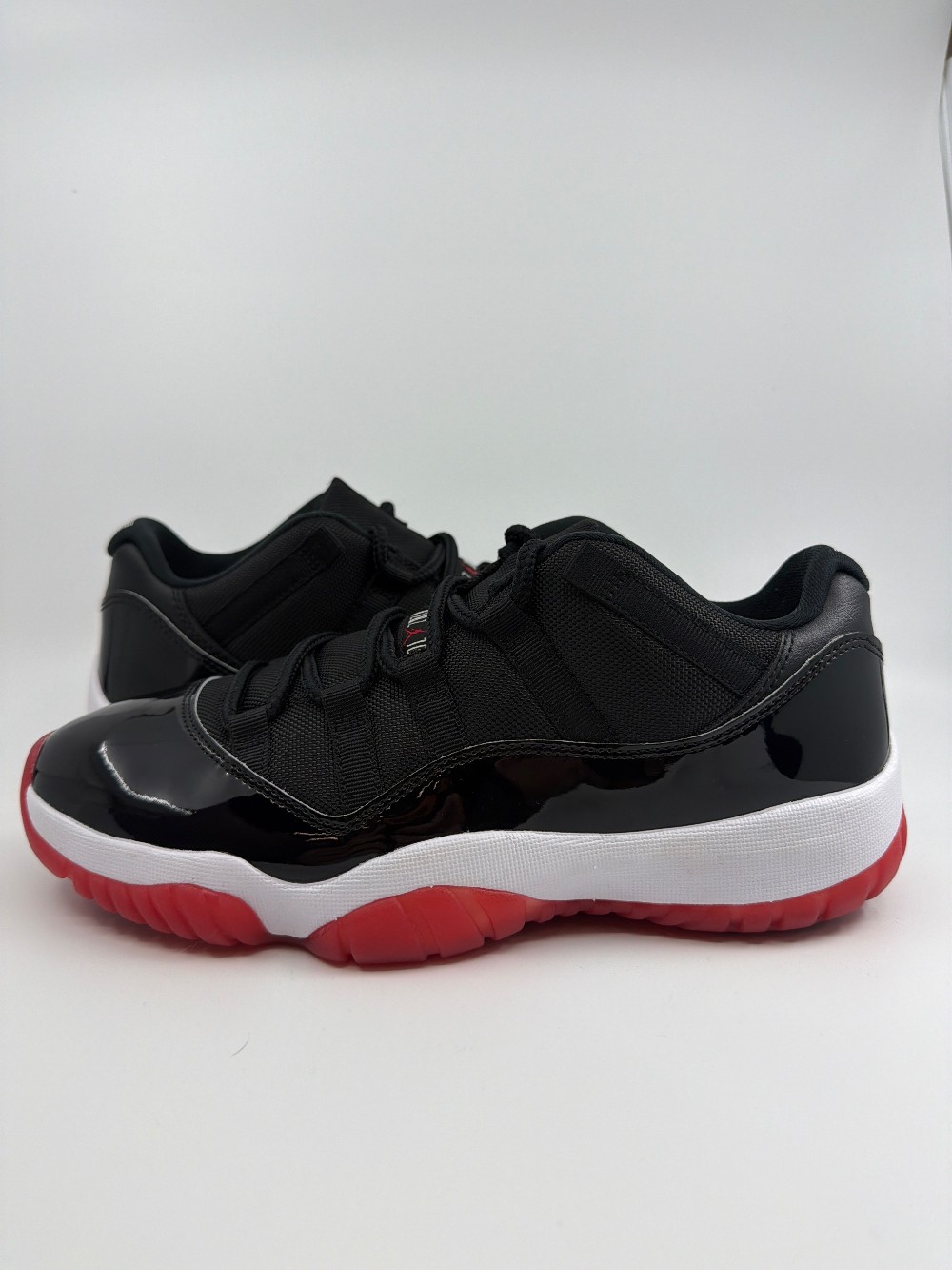 *USED* AJ 11 LOW - BRED (2025)