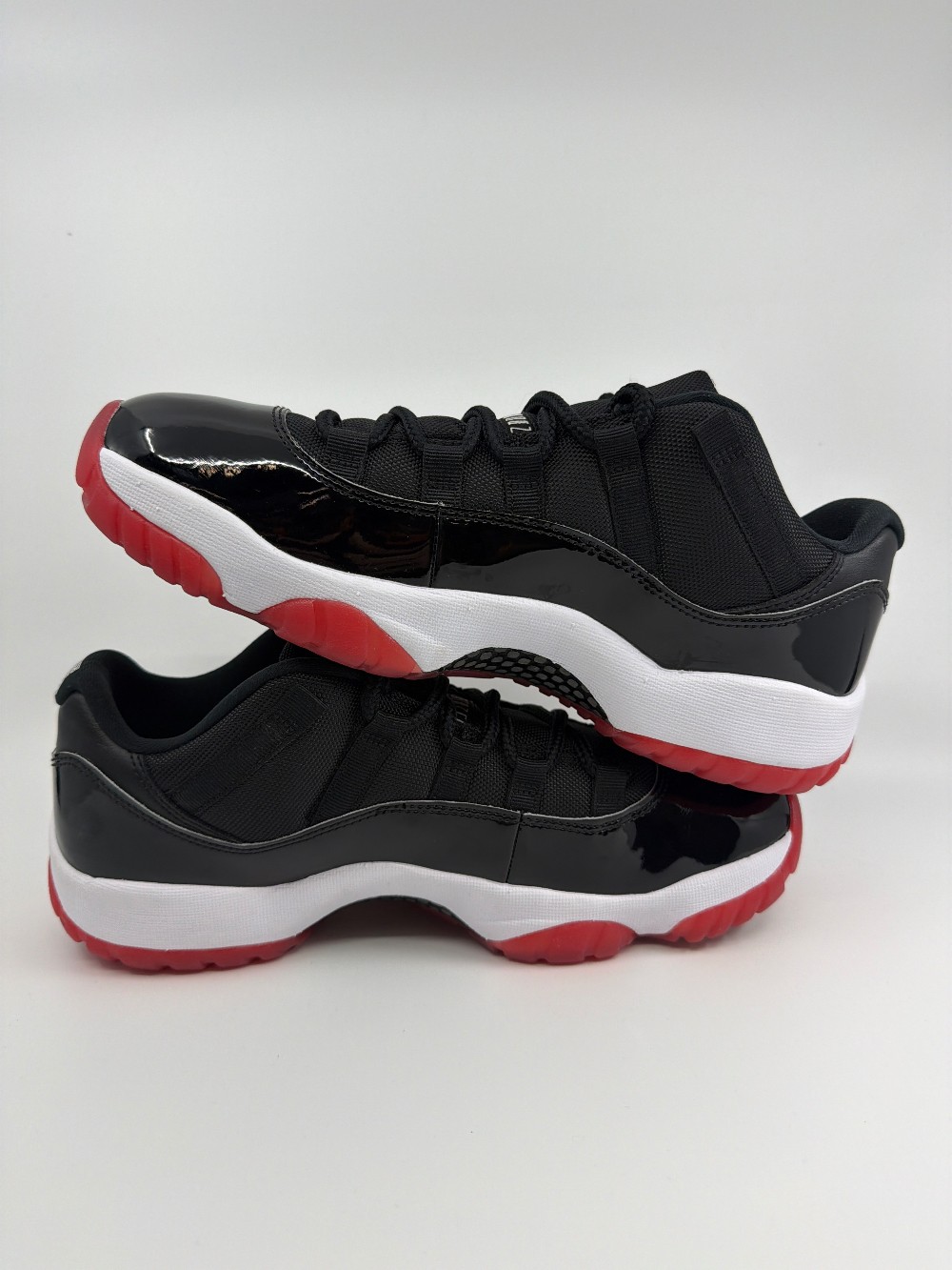 *USED* AJ 11 LOW - BRED (2025)