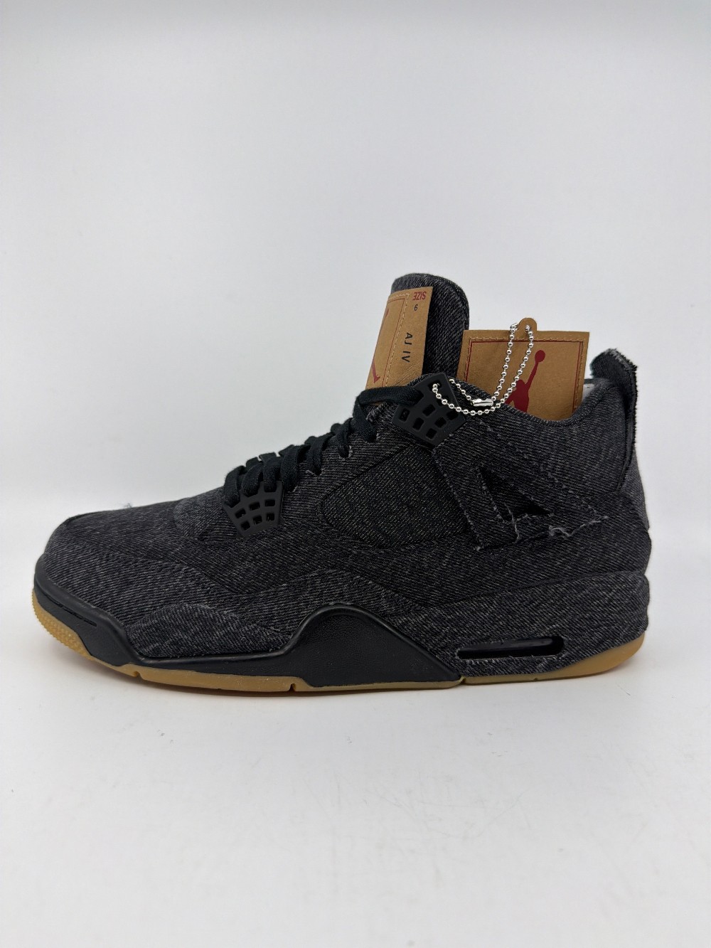AJ 4 - LEVI'S BLACK (LEVI'S TAG)