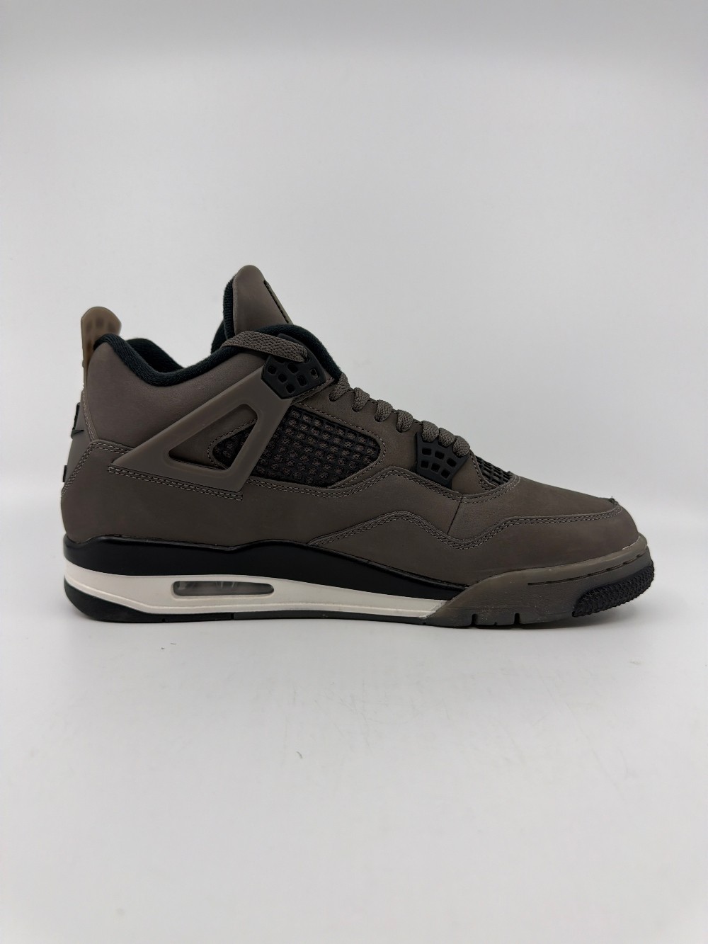 *USED* AJ 4 - CAVE STONE