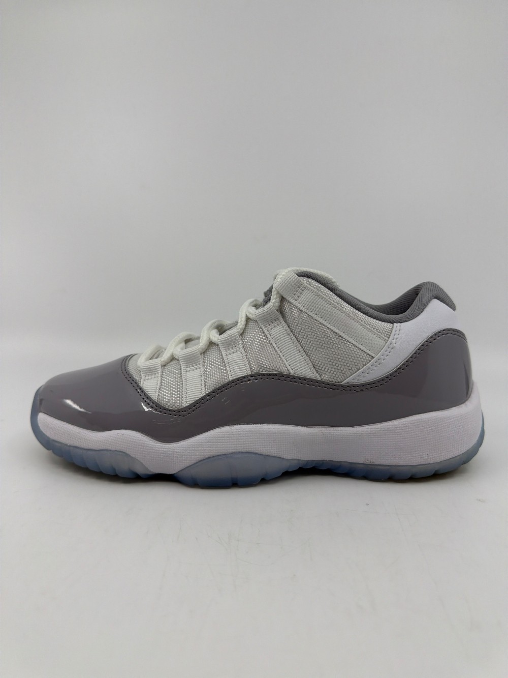 *USED* AJ 11 LOW (GS) - CEMENT GREY