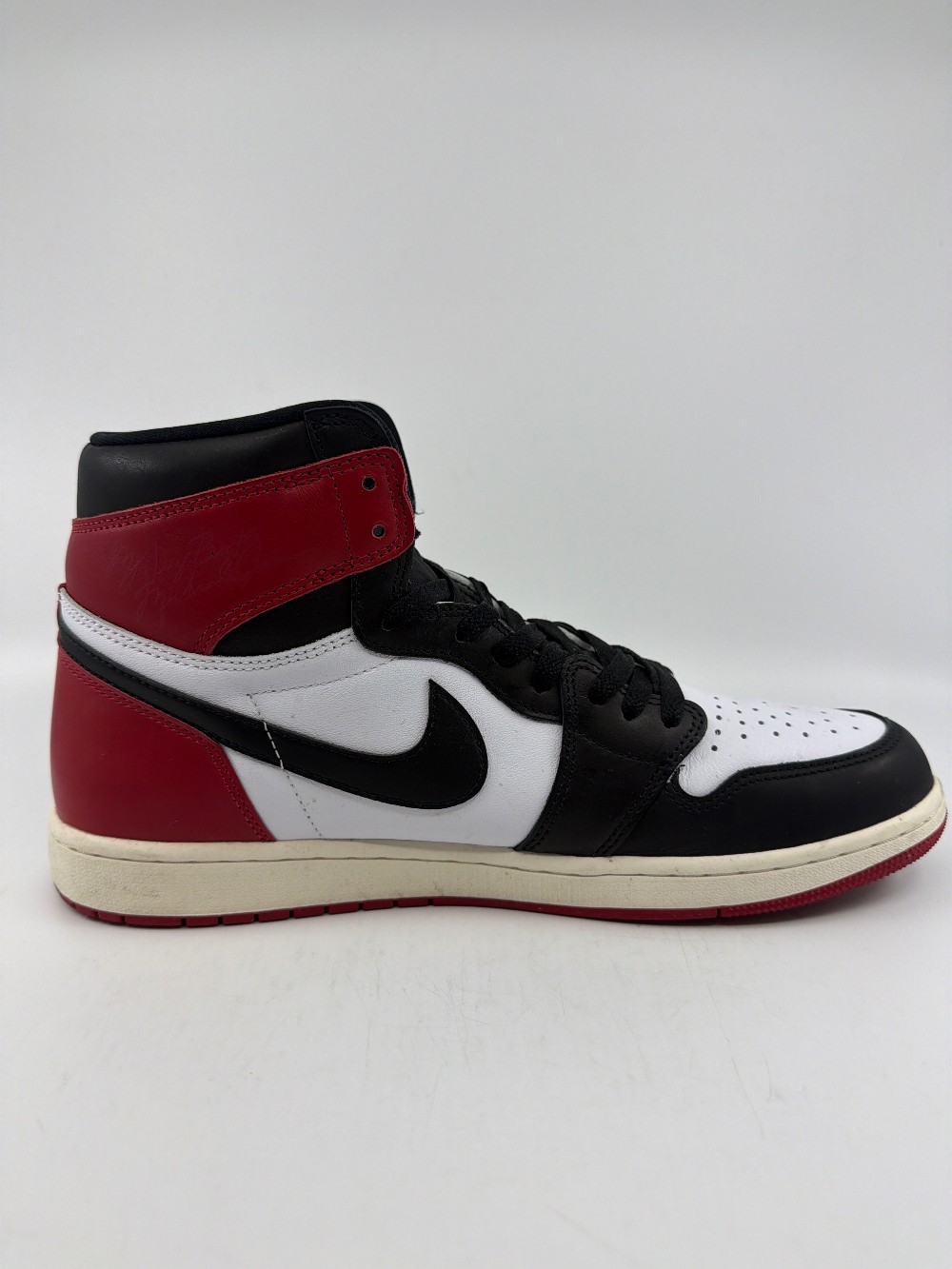 *USED* AJ 1 - BLACK TOE REIMAGINED