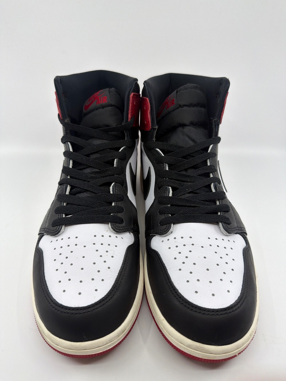 *USED* AJ 1 - BLACK TOE REIMAGINED