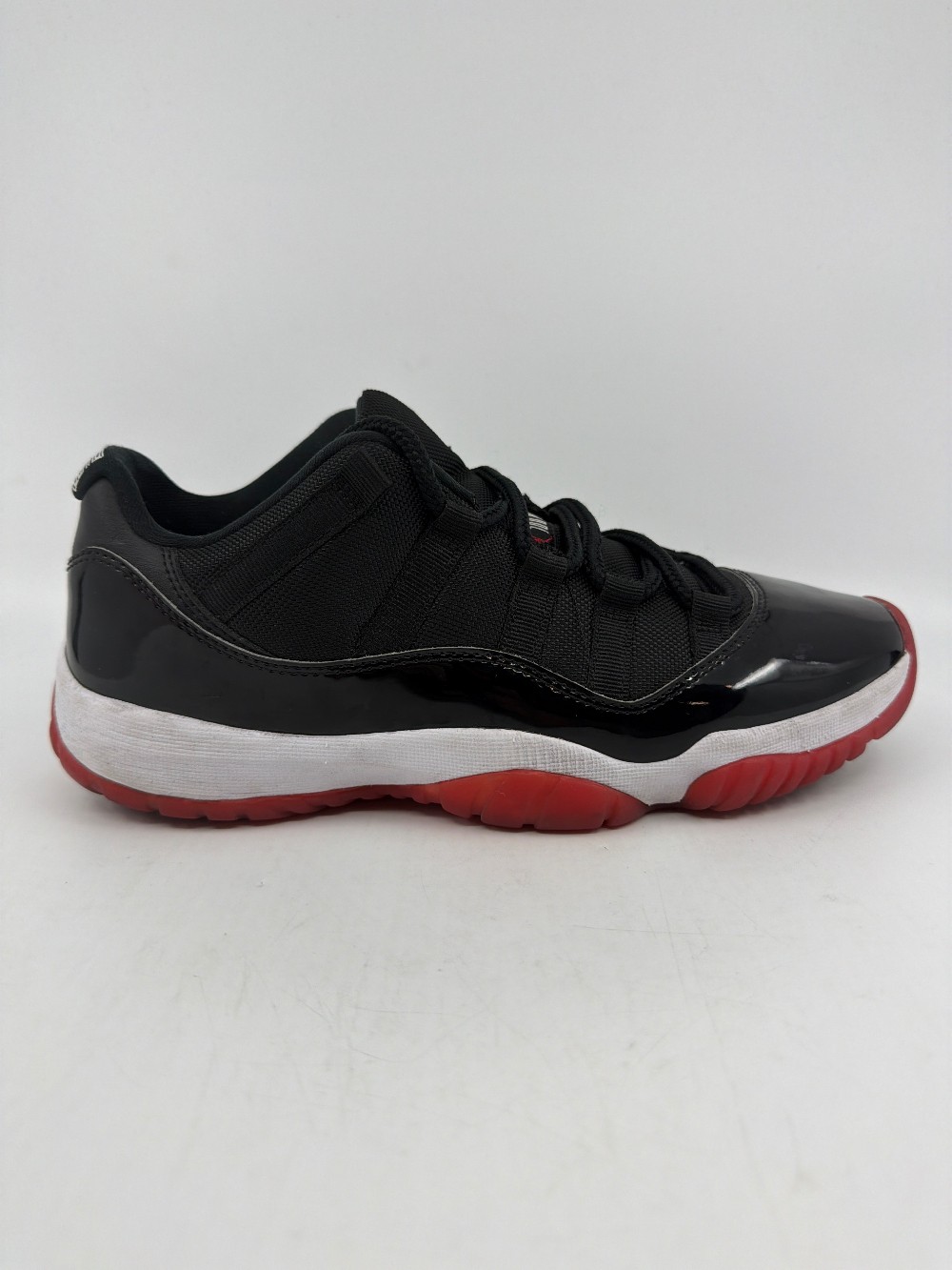 *USED* AJ 11 LOW - BRED (2025)