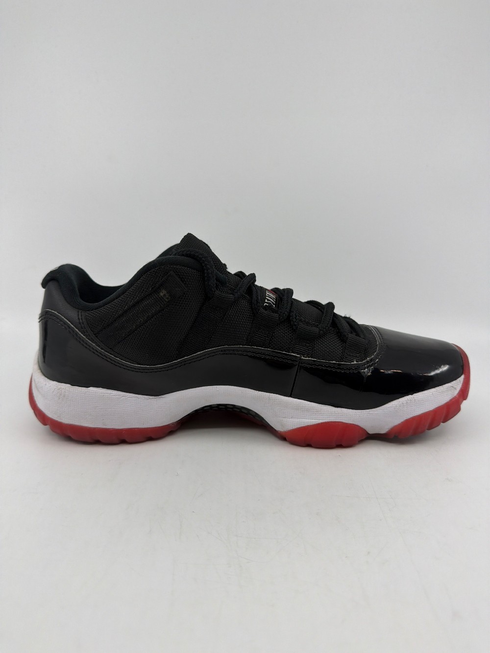 *USED* AJ 11 LOW - BRED (2025)