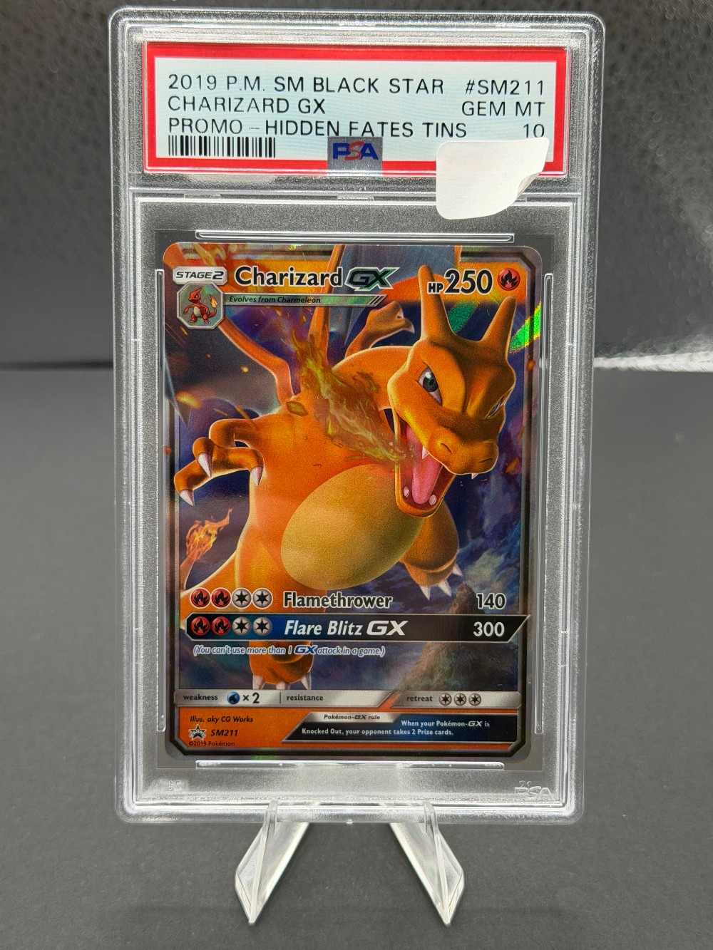 CHARIZARD GX BLACK STAR PROMO SM211 PSA 10