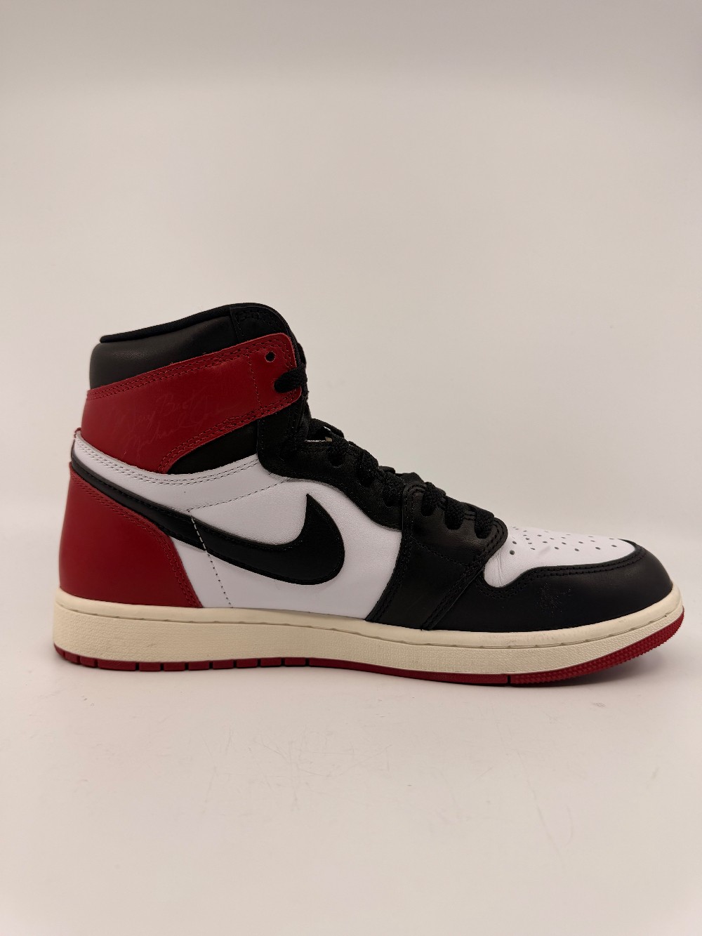 *USED* AJ 1 - BLACK TOE REIMAGINED