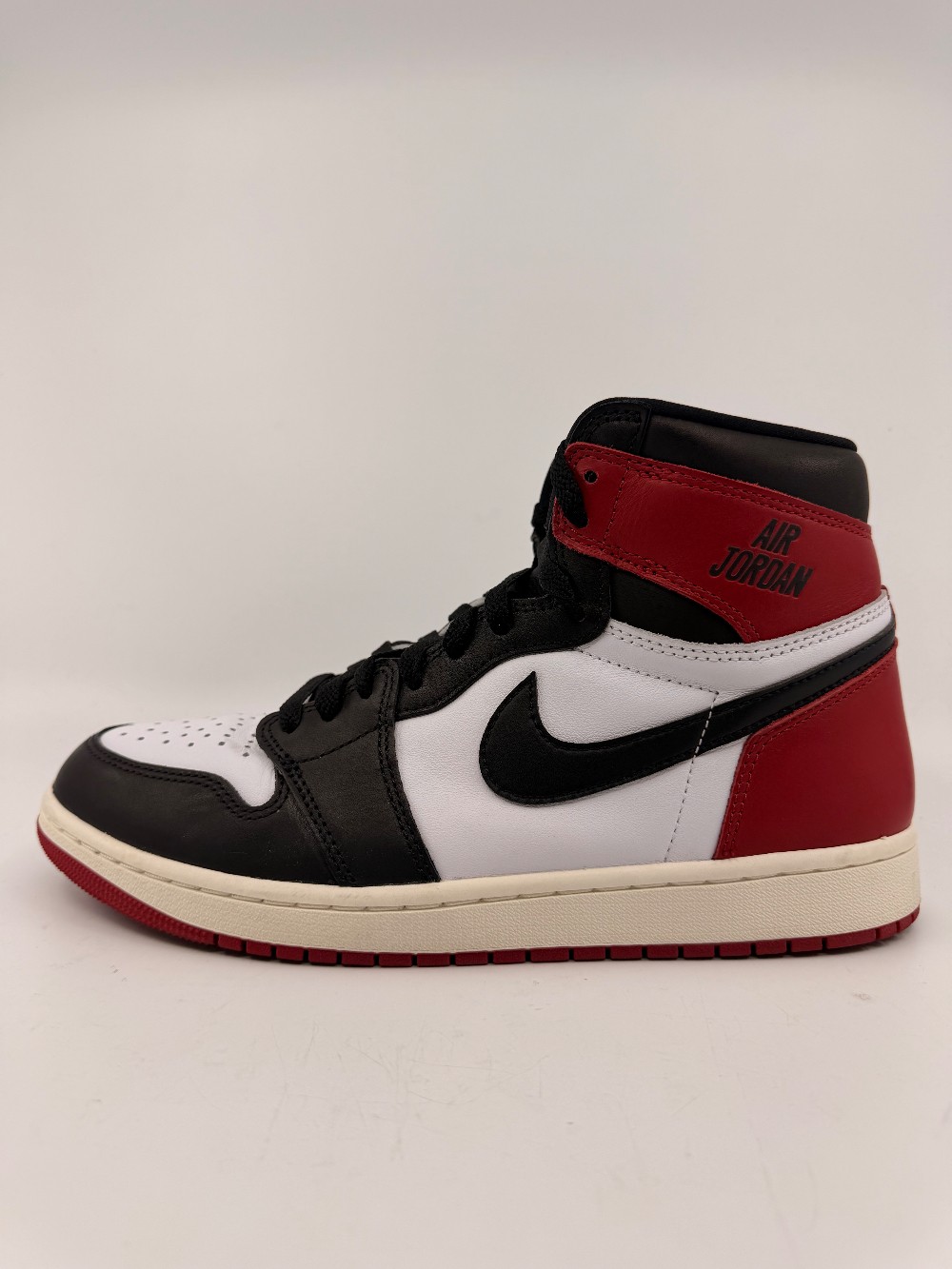 *USED* AJ 1 - BLACK TOE REIMAGINED