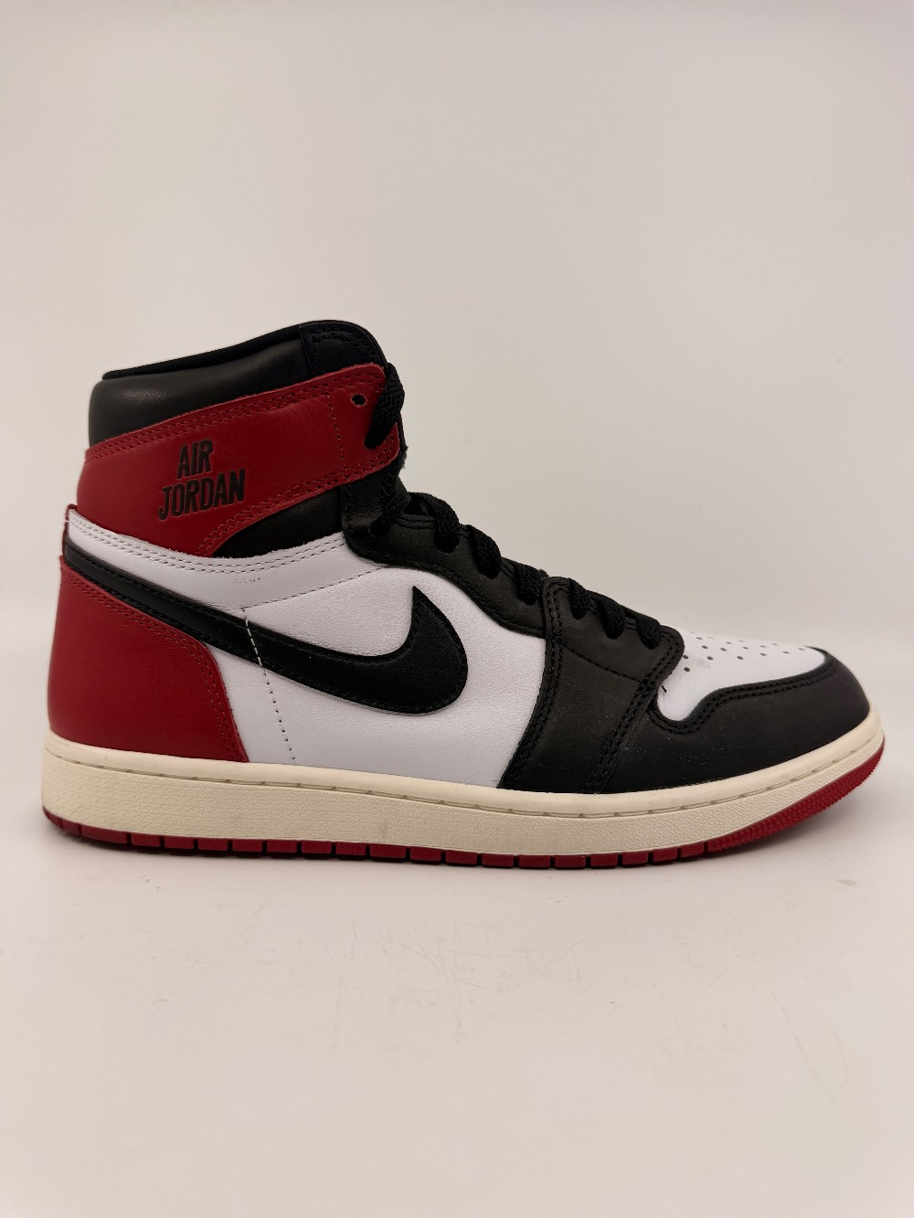 *USED* AJ 1 - BLACK TOE REIMAGINED