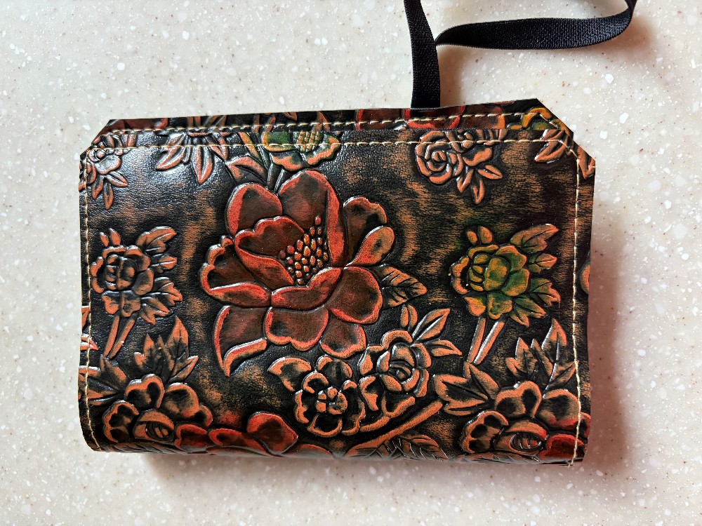 Embossed vinyl mini notebook cover