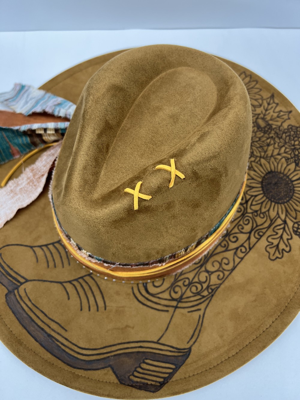 F-Fedora  med brown cowboy boot and flowers