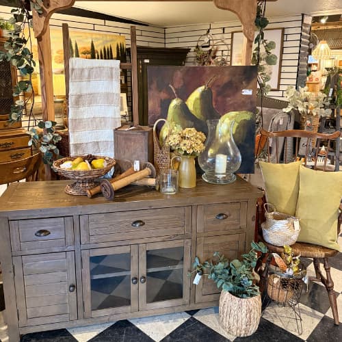 A display of furniture and accessories inside Under the Arbor.