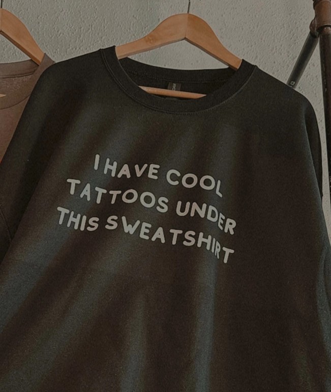 Sweatshirt: I have cool tattoos under this sweatshirt