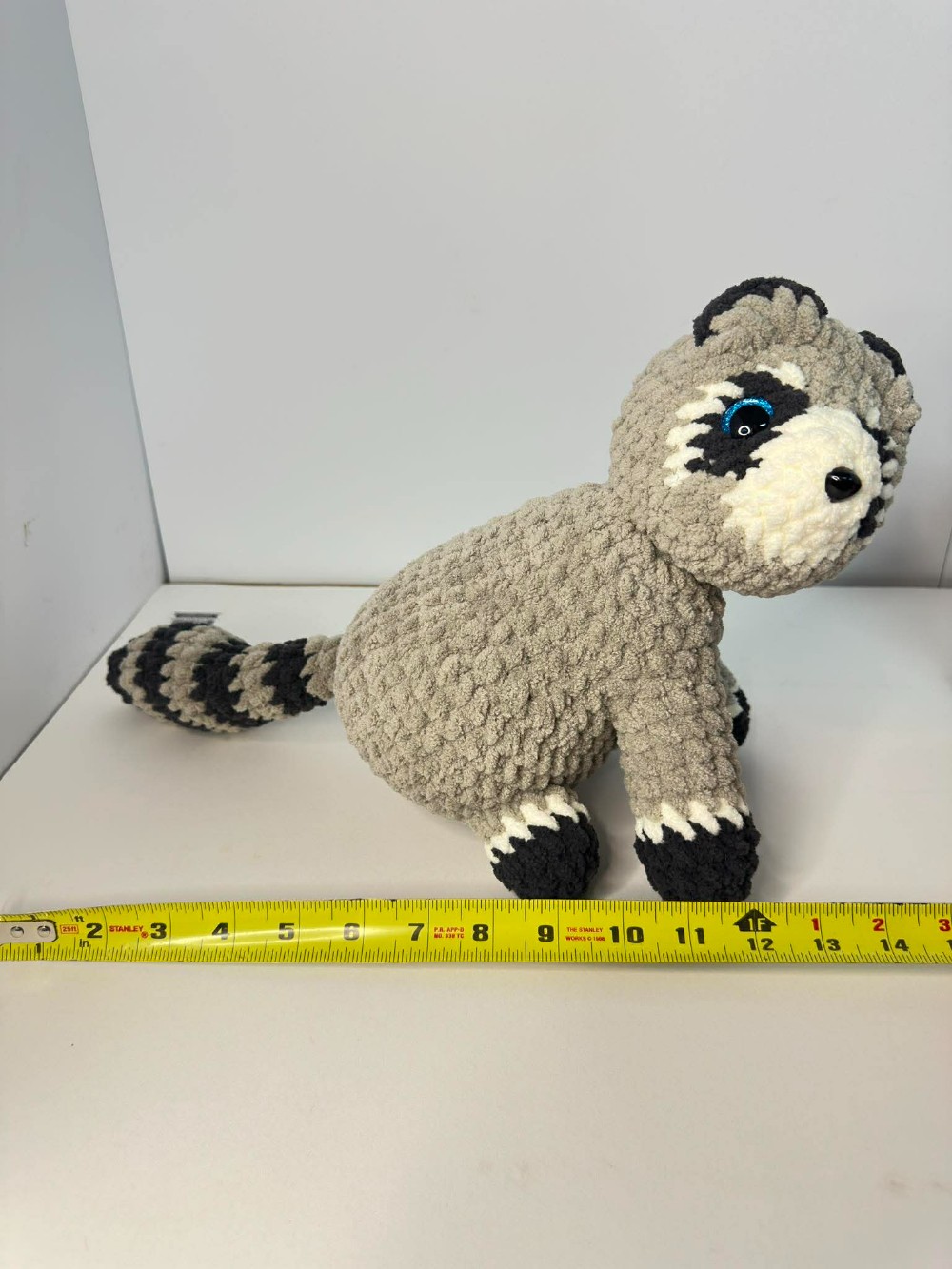 D- Large Sitting Racoon Plushie