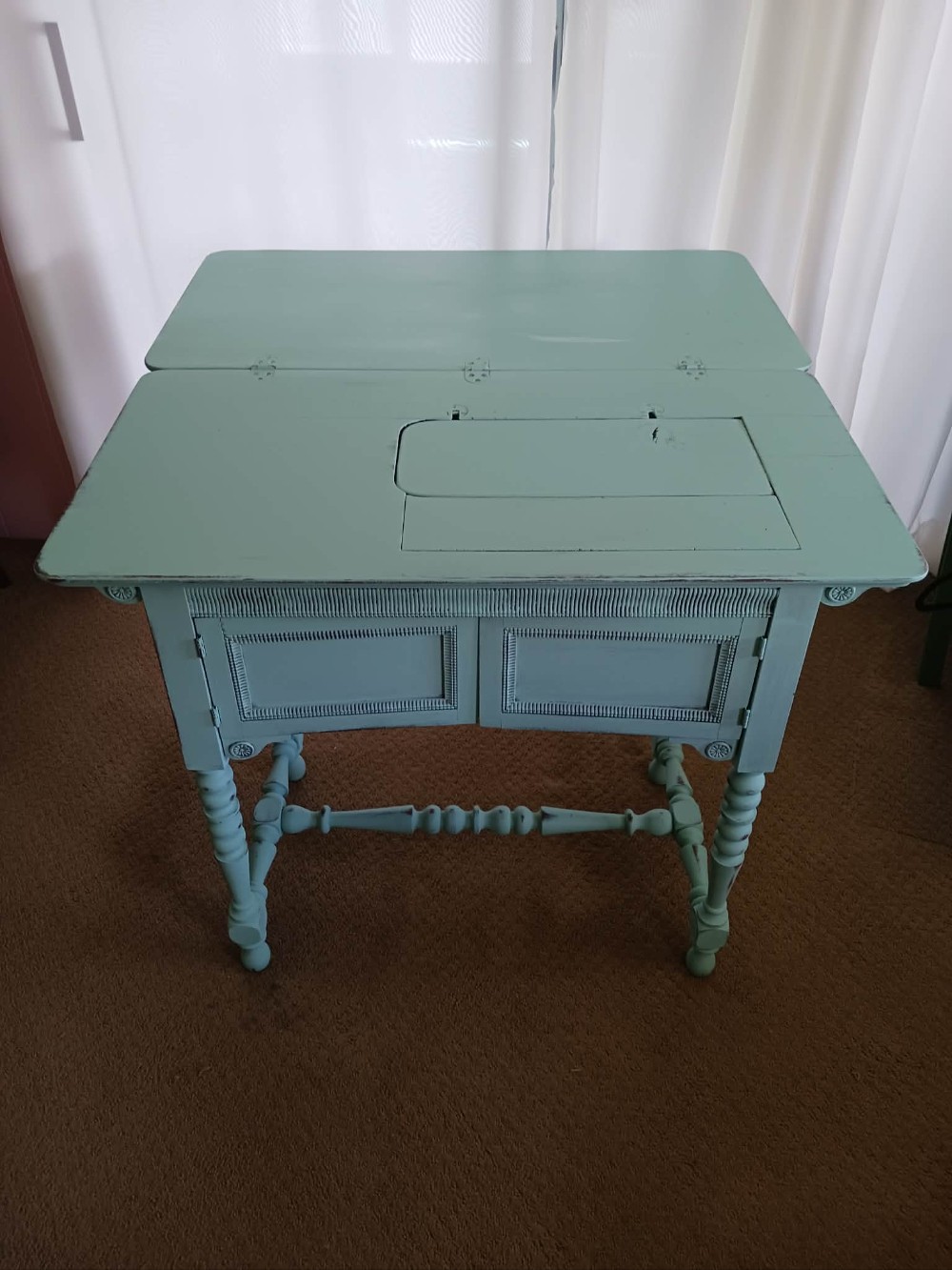 Shabby Chic repurposed sewing cabinet.
