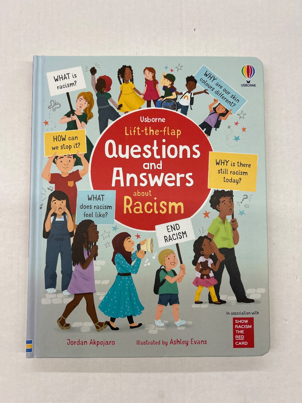 Lift-the-flap Questions and Answers about Racism