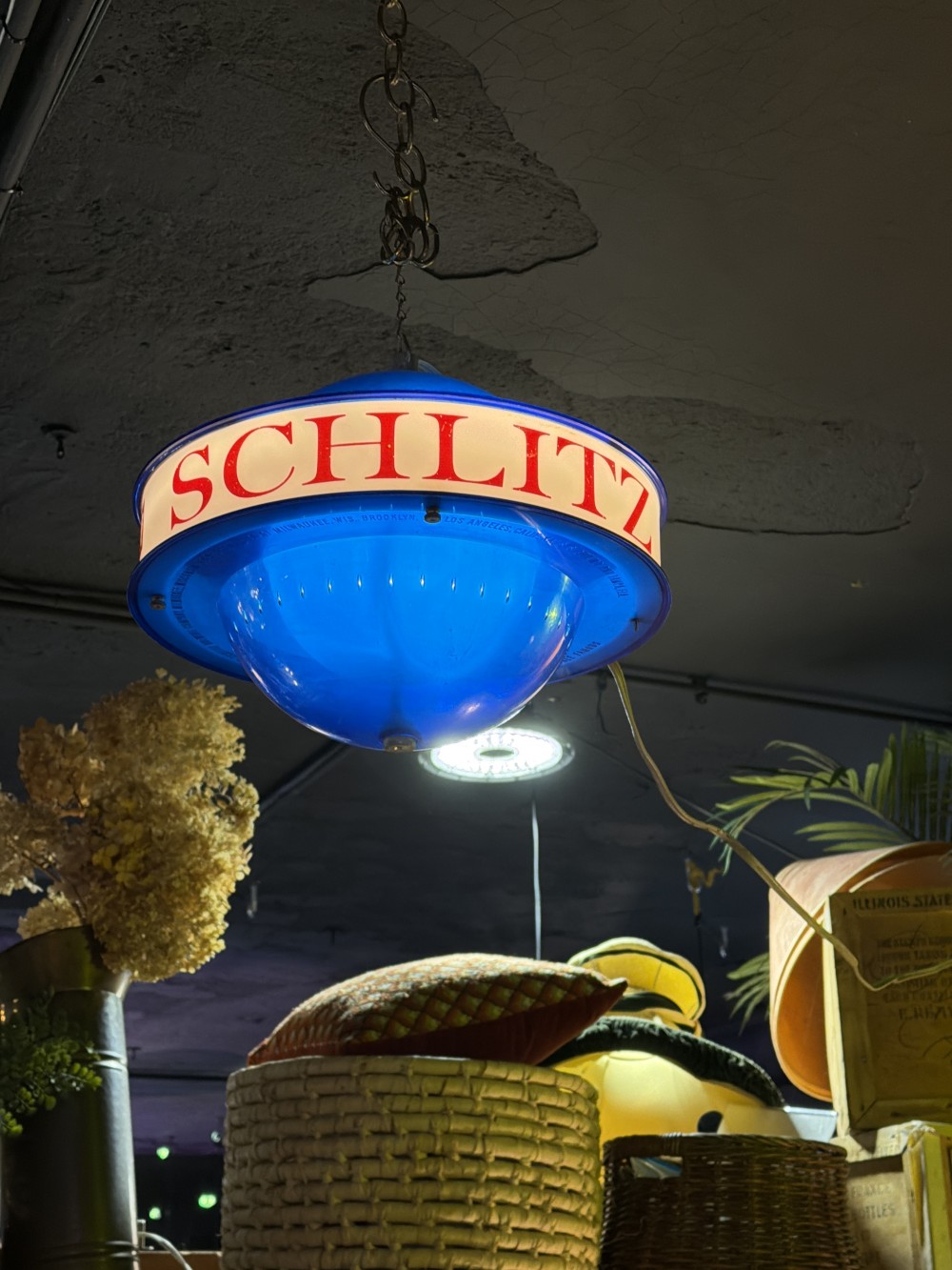 Schlitz hanging globe light.