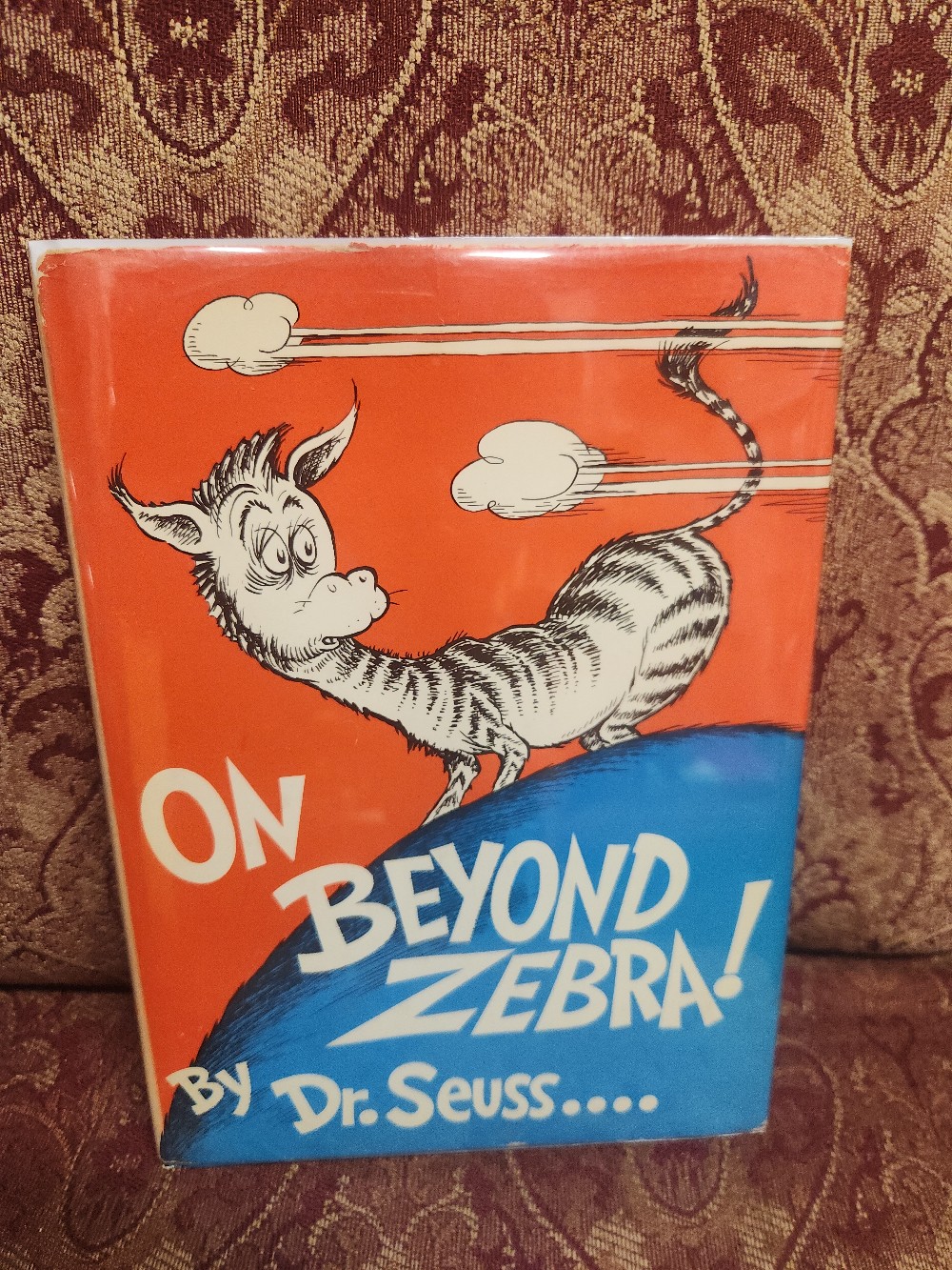 On Beyond Zebra by Dr. Seuss. Price firm