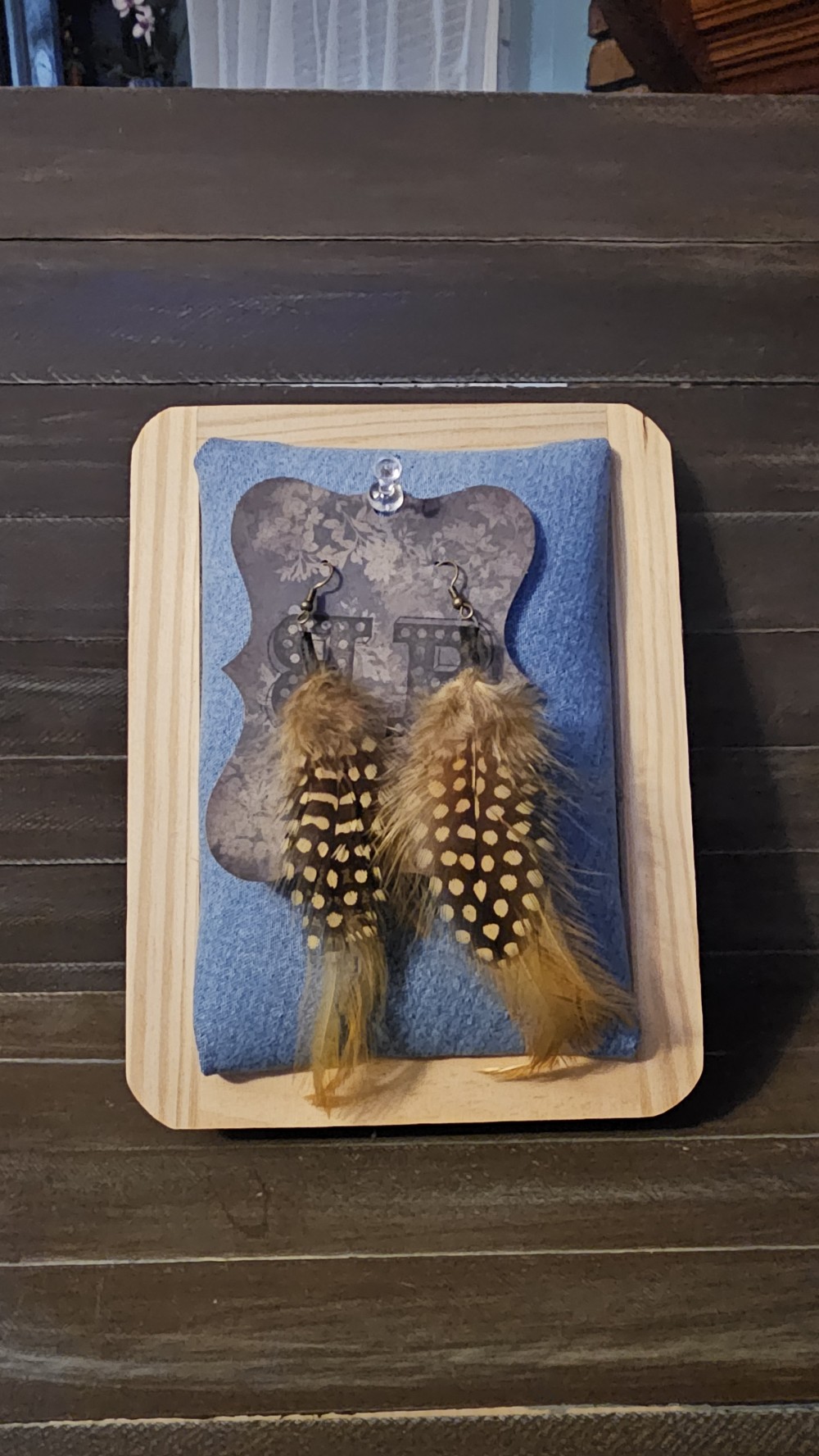 Tan/spotted feather earrings