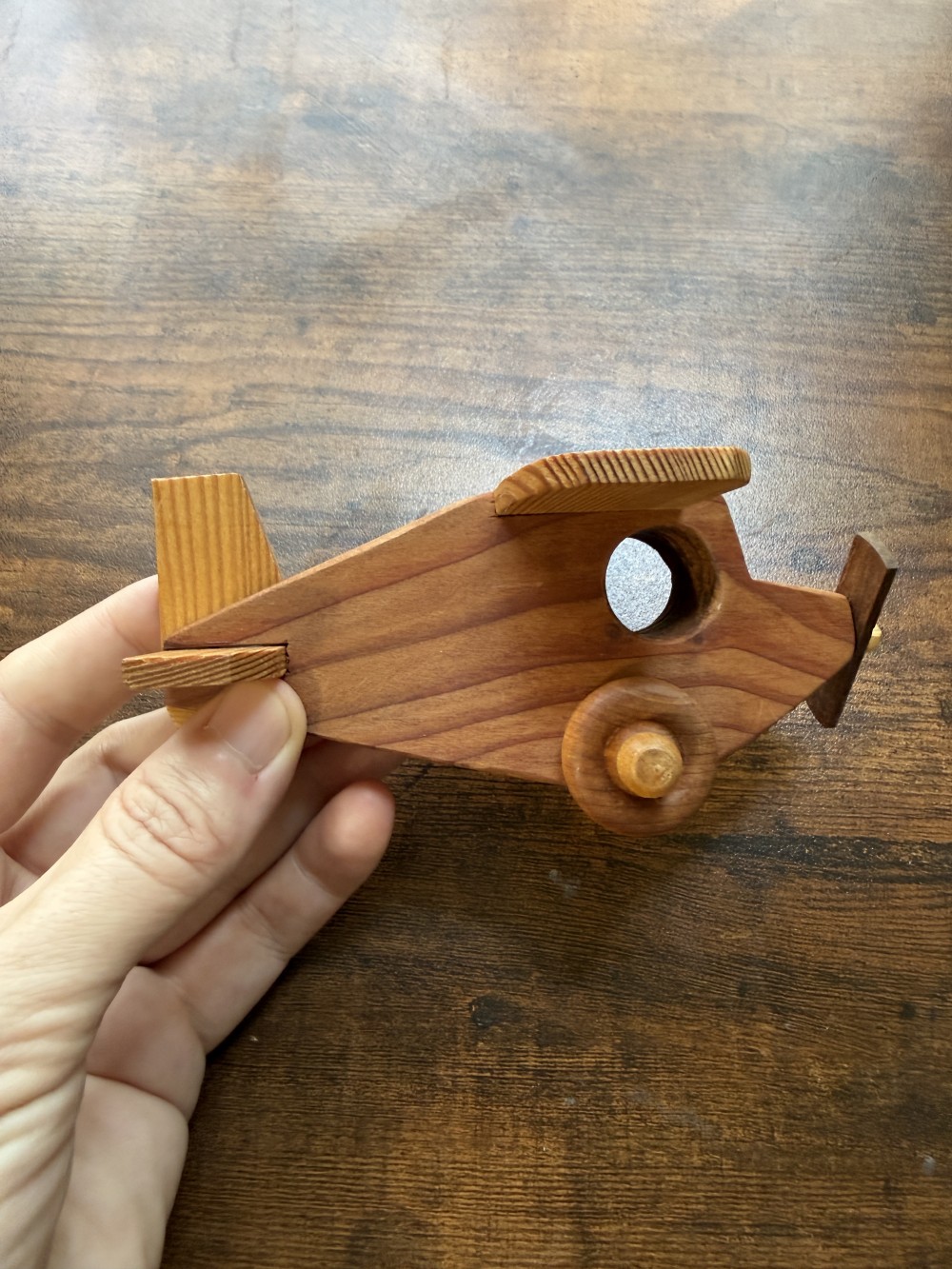 Handmade wooden biplane toy
